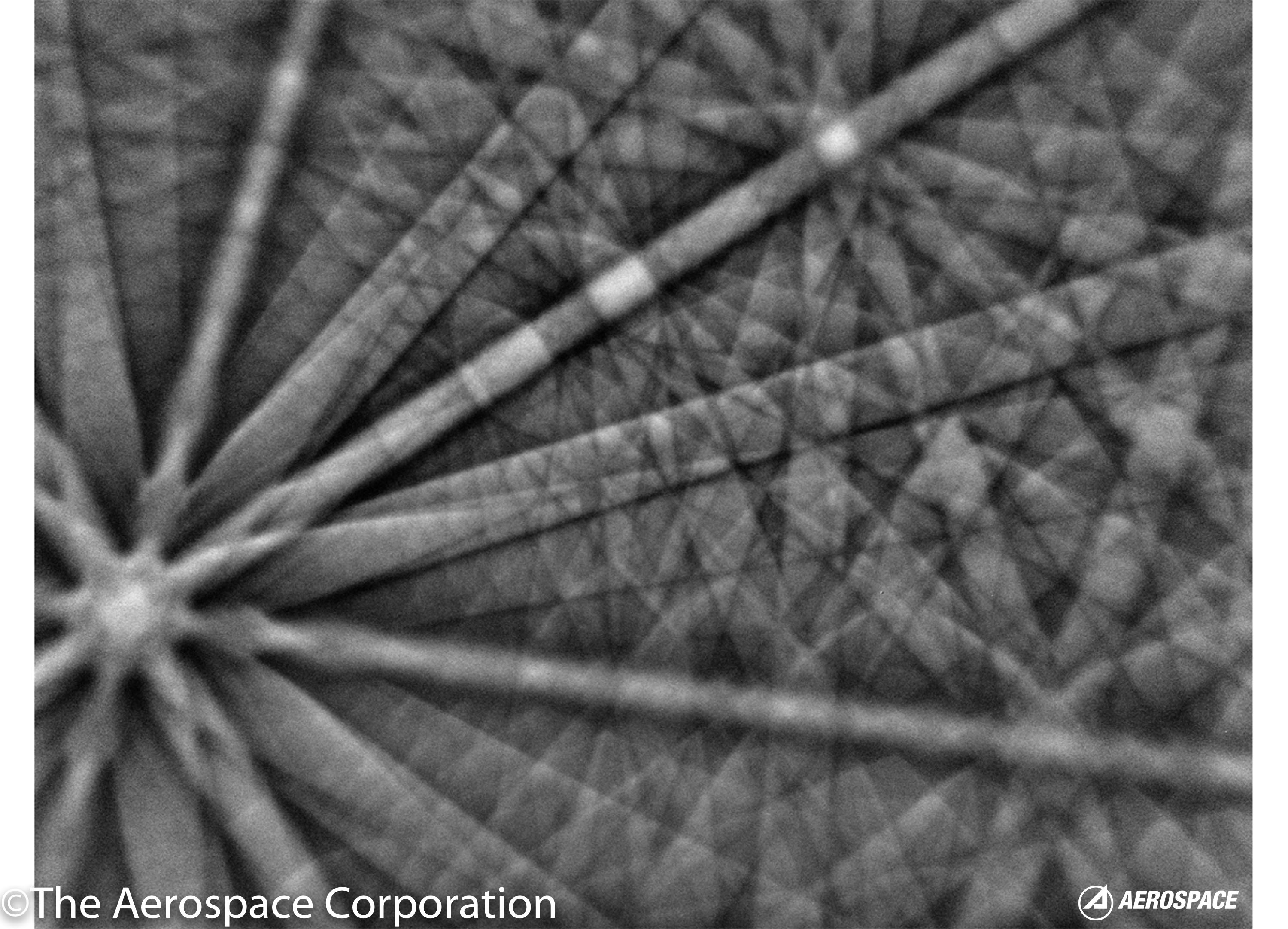 Tin Star: A tin whisker is an extrusion that can sprout from tin plating and cause electrical shorts in space hardware. This image from a scanning electron microscope shows the electron diffraction pattern from a tin whisker.