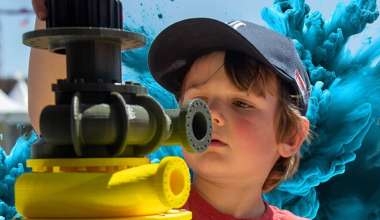 Child looking at machinery.