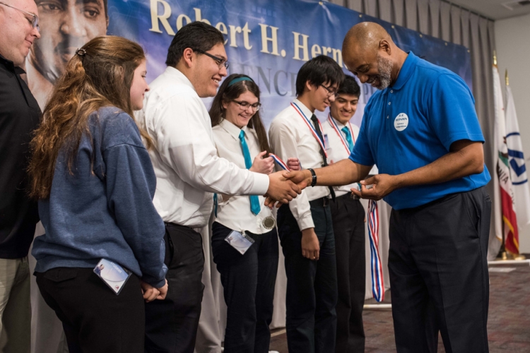 Carl Billingsley congratulates winners in El Segundo  