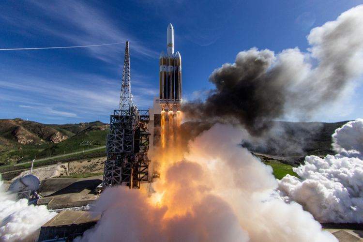 Delta IV Heavy rocket launching from Vandenberg.