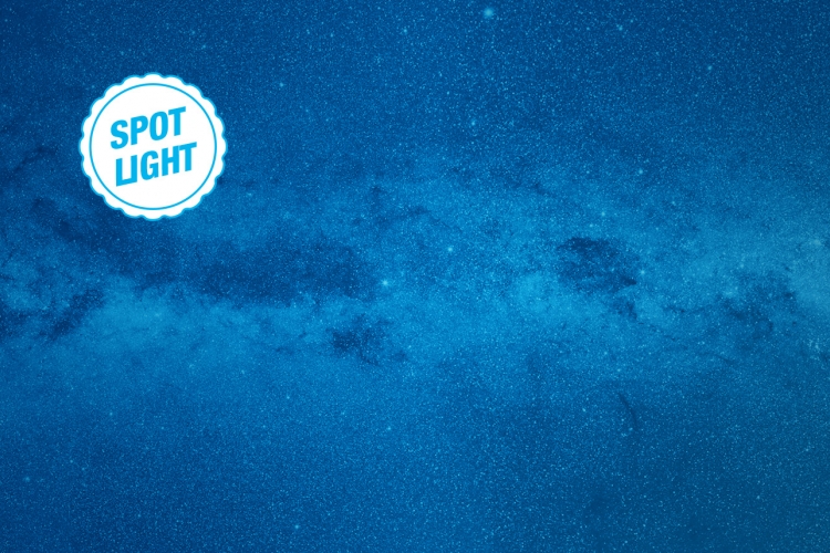 Star field background with award sticker on top