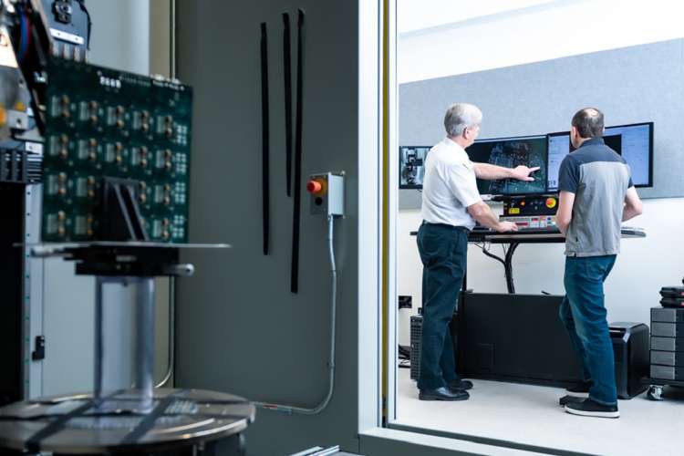 Scientists work in Aerospace's CT Scanning Lab